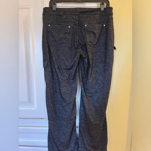 Athleta black heather cargo pants. The legs have a drawstring at the bottom.